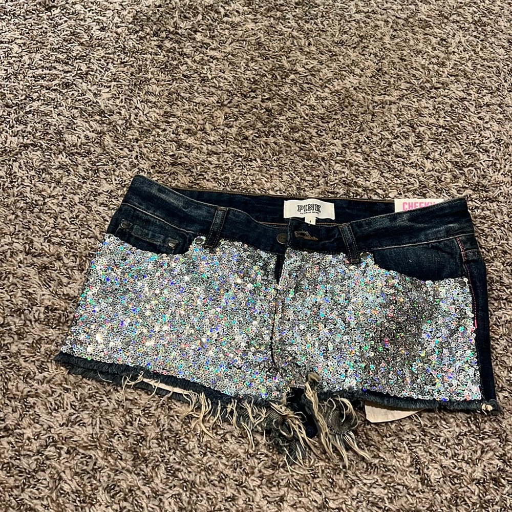 PINK cheeky cut off shorts with sequins